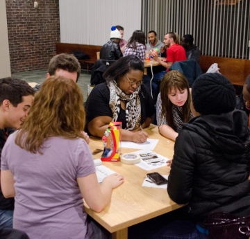 Student playing game inside their hall