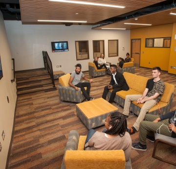 Honors Student Playing Video Game at Bishop Hall